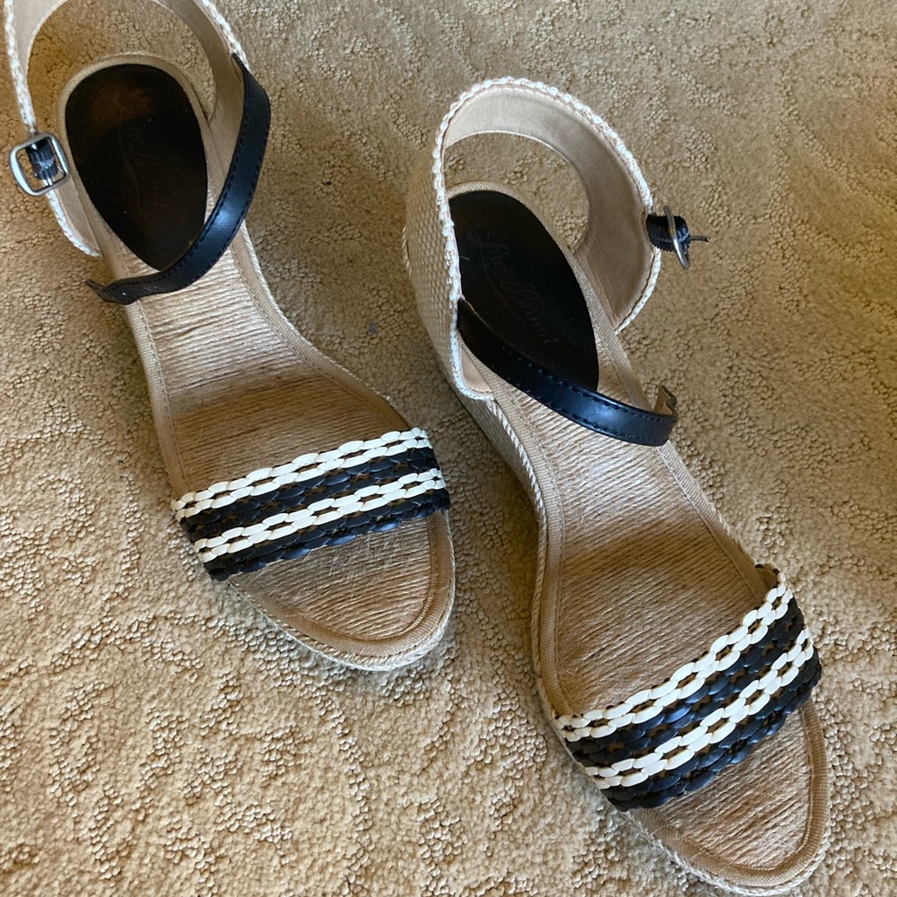 Lucky Brand wedge sandal with black and ivory toe wrap with wheat shoe detail .